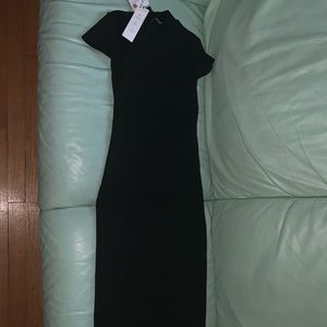 New!! long black dress with opening in the back comes above ankle